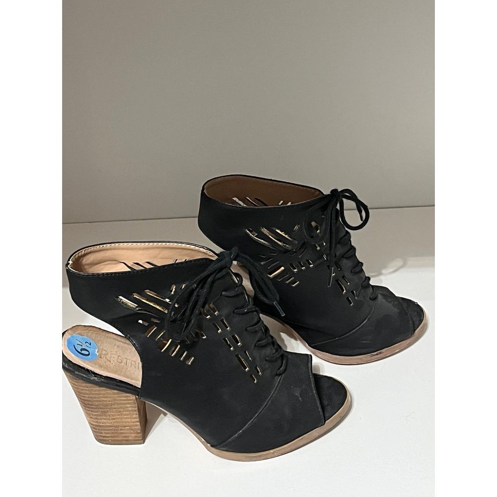 Restricted high heel black cut out shoes size 6.5